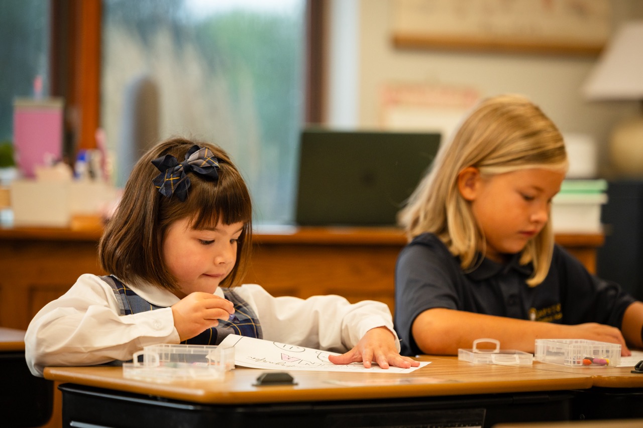 Two girls working